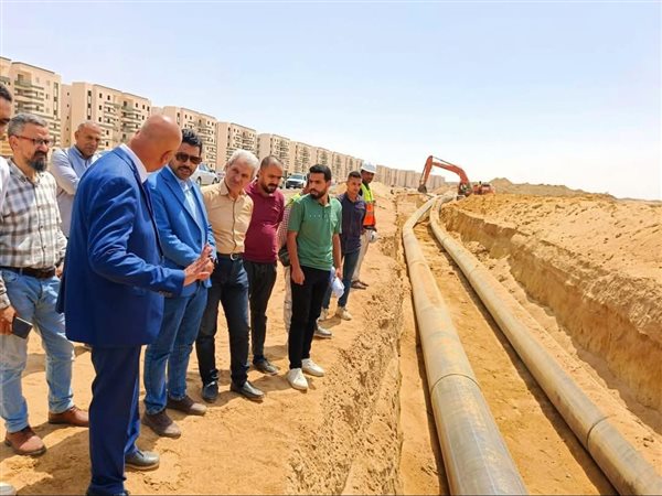 تنفيذ خطوط مياه شرب وصرف وشبكات ومحطة محولات كهرباء وطرق بالعبور الجديدة