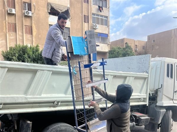 حملات لرفع الإشغالات ومتابعة رخص التشغيل للمحلات بالشيخ زايد 