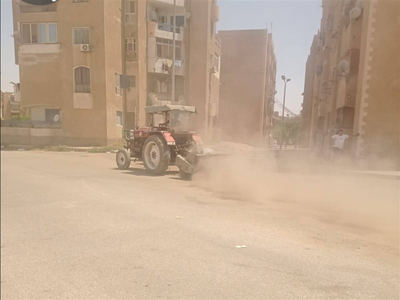 عملية تنظيف الشوارع بجهاز الشروق